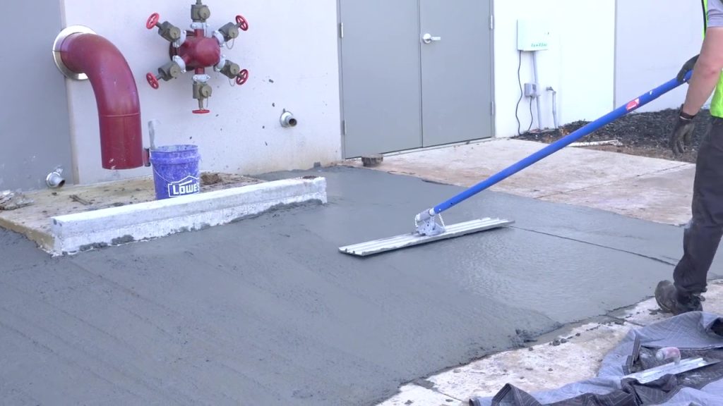 Finishing the Concrete With A Concrete Broom, Proline PLM