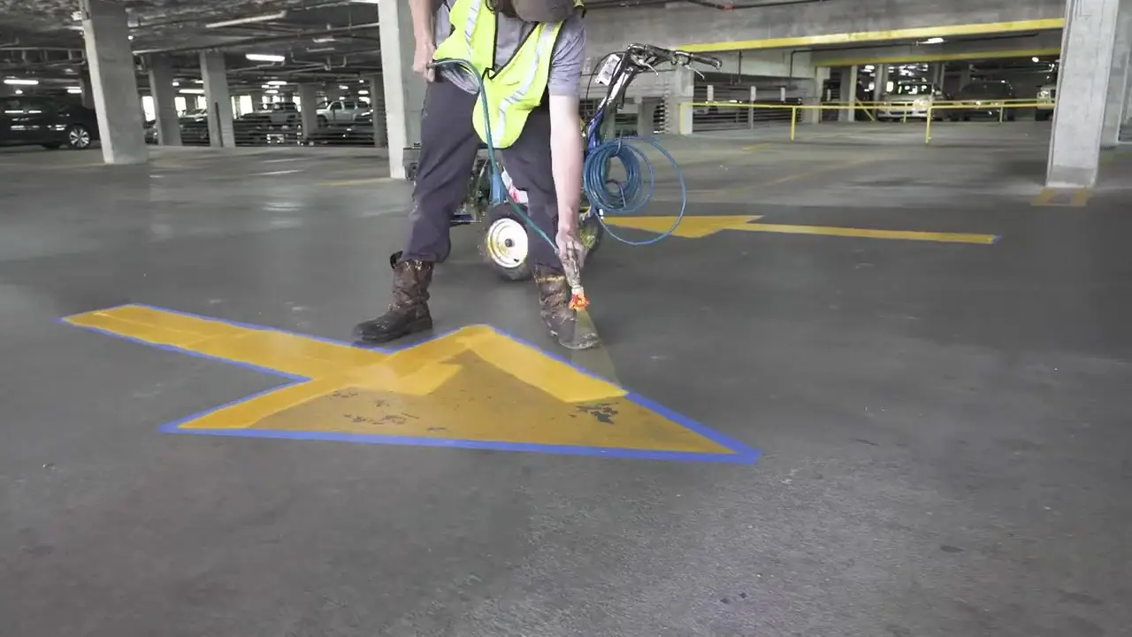 Painting yellow directional arrow