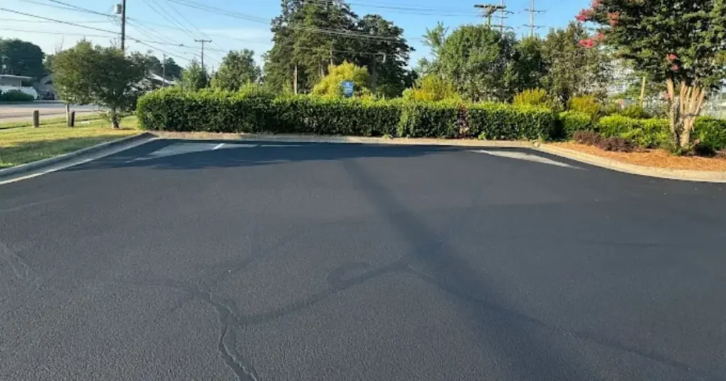 Freshly paved black asphalt parking lot